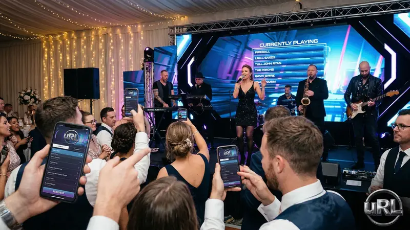 Wedding guests using phones to request songs from interactive live band